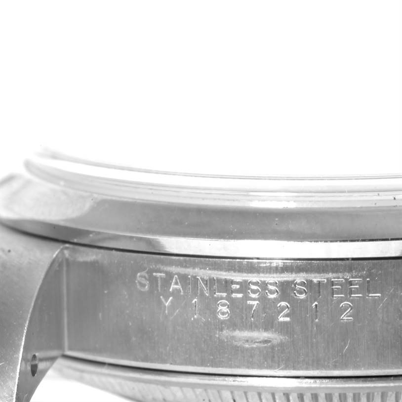 The image shows the side view of the case and the serial number engraved on the bezel of the Rolex Date 15200 Men's Stainless Steel Pink Dial 15200 Men's Stainless Steel Pink Dial model.