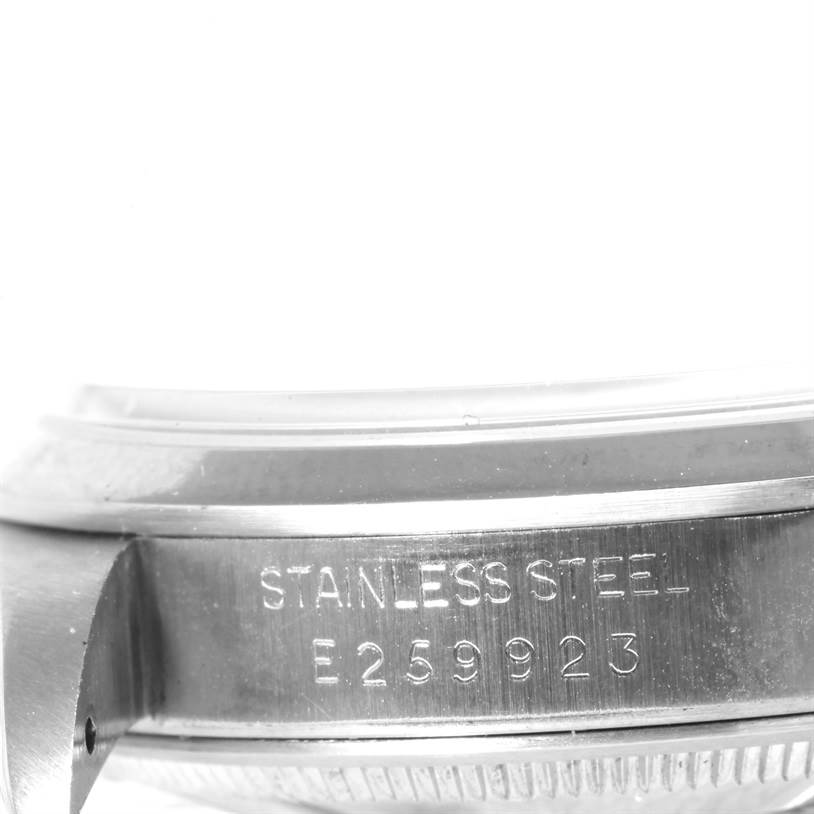 The image shows a close-up of the side engraving on a stainless steel Rolex Date 15200 Men's Stainless Steel Silver Dial 15200 Men's Stainless Steel Silver Dial model watch.