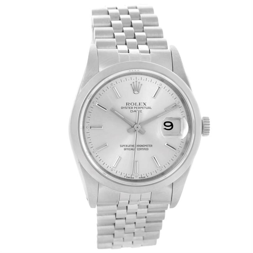 The image shows a front view of a Rolex Oyster Perpetual Date watch, highlighting the dial, bracelet, and date window.