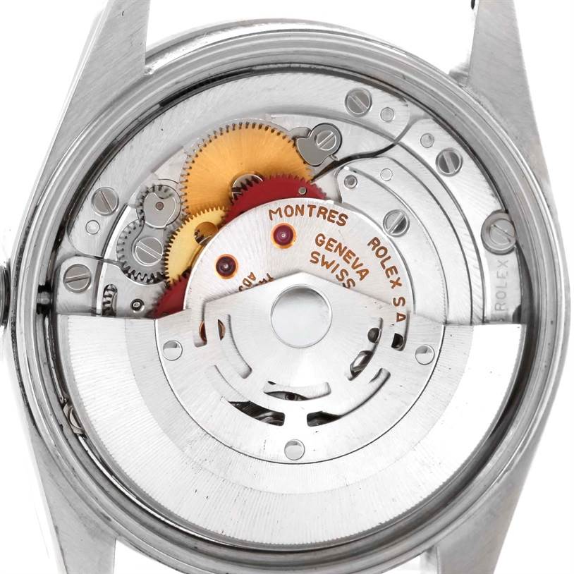 This is a close-up view of the movement inside the Rolex Date 15200 Men's Stainless Steel Silver Dial 15200 Men's Stainless Steel Silver Dial model watch, showing gears and the rotor.