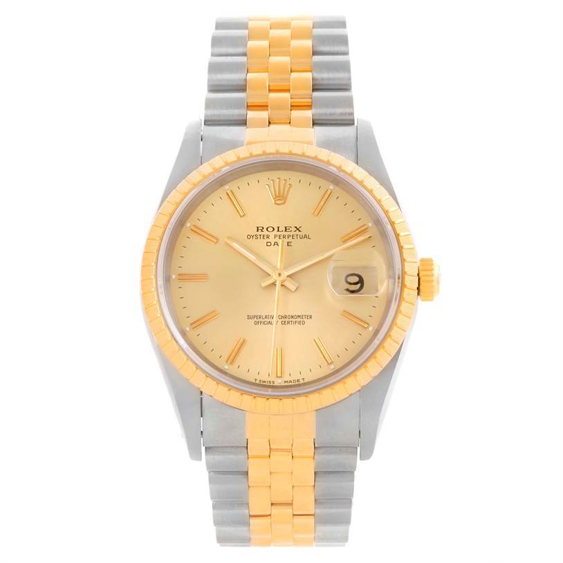 This image shows a front view of the Rolex Date 15223 Men's Steel and Gold (two tone) Champagne Dial 15223 Men's Steel and Gold (two tone) Champagne Dial model watch, featuring a gold and silver bracelet, gold bezel, and date display.