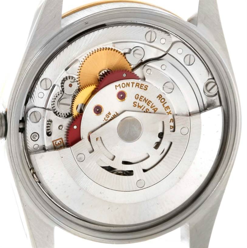 This image shows the movement mechanism of a Rolex Date 15223 Men's Steel and Gold (two tone) Champagne Dial 15223 Men's Steel and Gold (two tone) Champagne Dial model watch from the back angle without the case back.