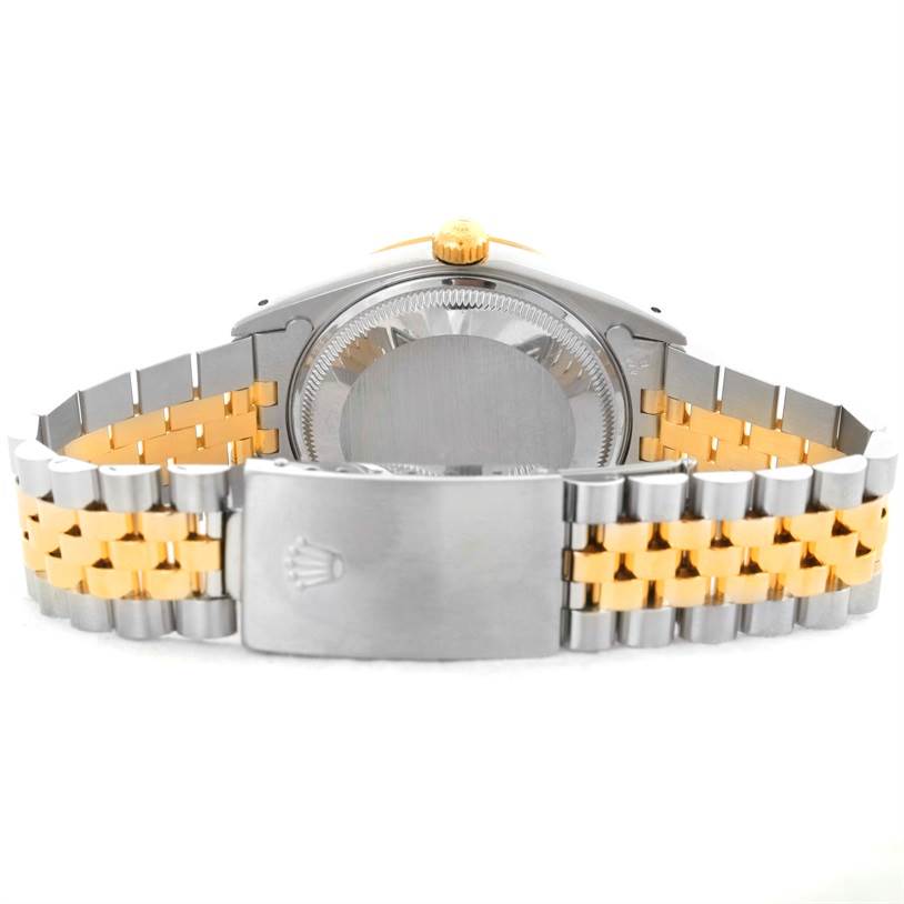 The image shows the back case, crown, and bi-color bracelet of a Rolex Date 15223 Men's Steel and Gold (two tone) Champagne Dial 15223 Men's Steel and Gold (two tone) Champagne Dial model watch.