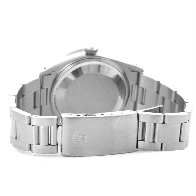 This image shows the back case and clasp of a Rolex Date 15210 Men's Stainless Steel Silver Dial 15210 Men's Stainless Steel Silver Dial model watch at a slightly elevated rear angle.