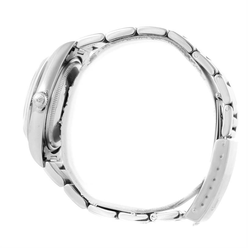 The image shows a side profile of the Rolex Date 15200 Men's Stainless Steel Silver Dial 15200 Men's Stainless Steel Silver Dial model watch, highlighting the crown and bracelet.