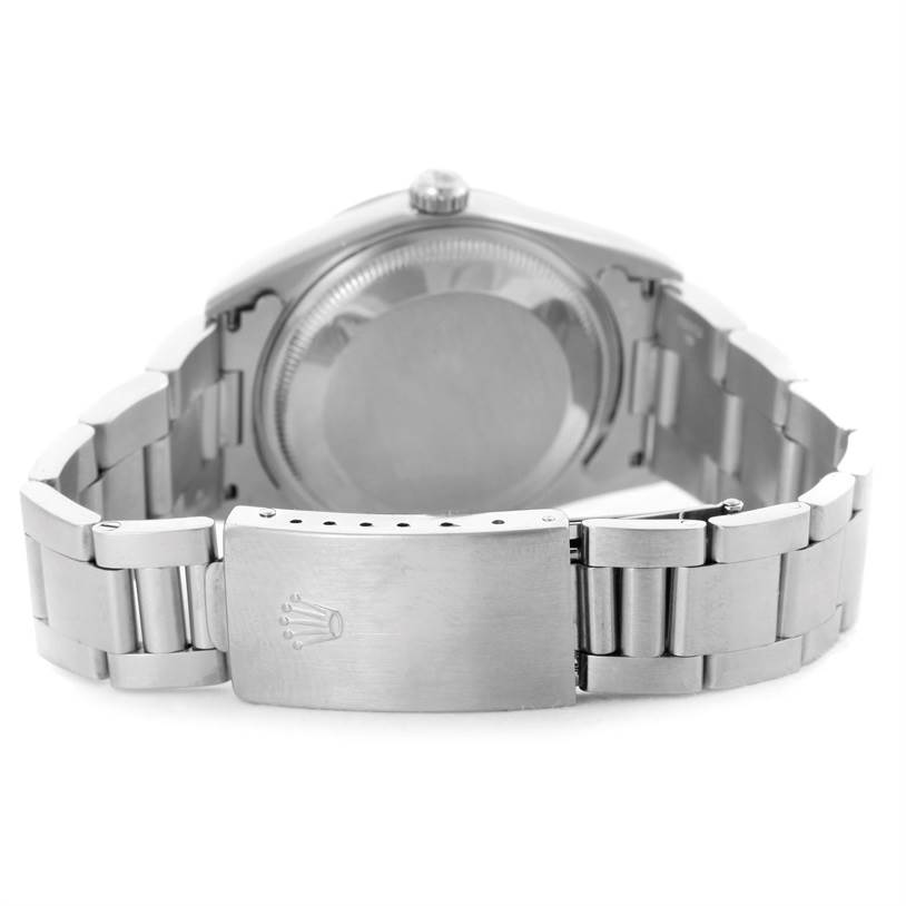 The image shows the back and clasp of a Rolex Date 15200 Men's Stainless Steel Silver Dial 15200 Men's Stainless Steel Silver Dial model watch, highlighting its metal bracelet and crown logo.