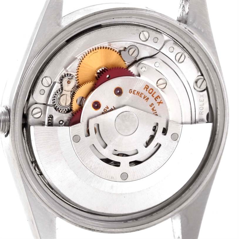 The image shows the movement and inner mechanics of a Rolex Date 15200 Men's Stainless Steel Silver Dial 15200 Men's Stainless Steel Silver Dial model watch, viewed from the back.
