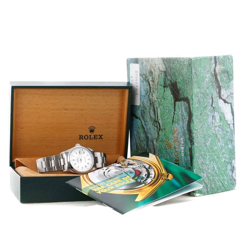 The image shows a Rolex Date 15200 Men's Stainless Steel White Dial 15200 Men's Stainless Steel White Dial watch with its bracelet, box, outer box, and booklets from a front angle.