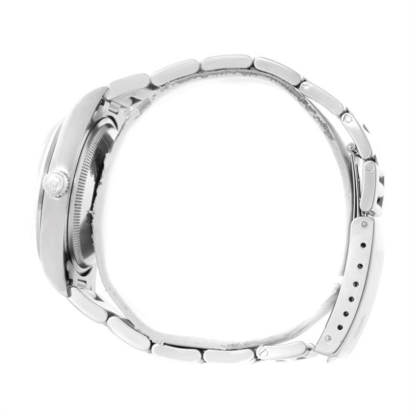 The image displays a side view of a Rolex Date 15200 Men's Stainless Steel Black Dial 15200 Men's Stainless Steel Black Dial model watch, showing its crown, case, and bracelet.