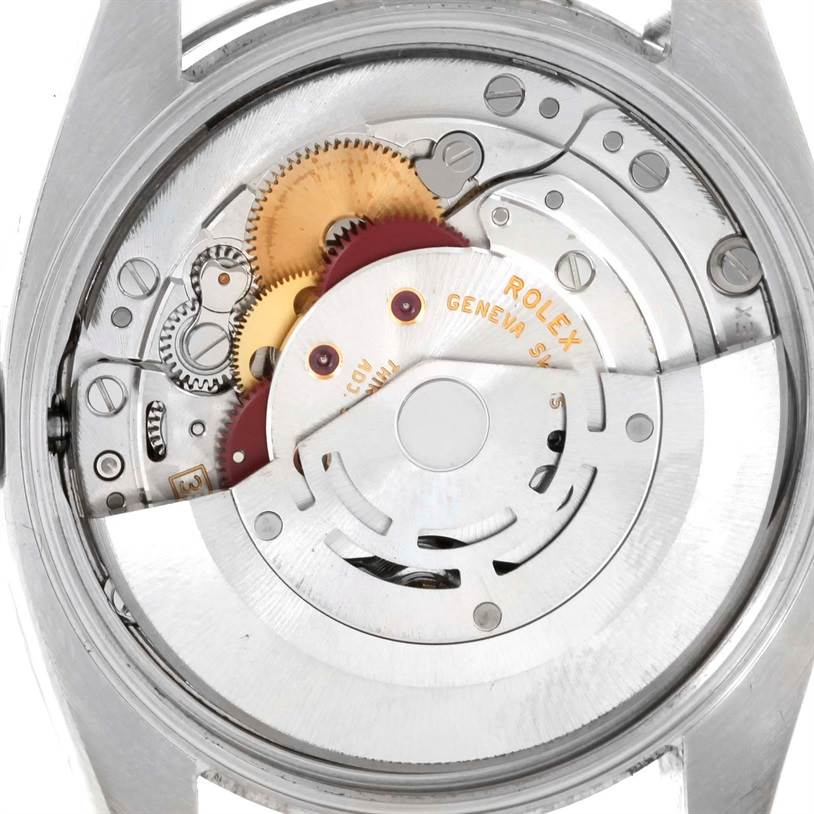 This image shows the internal mechanism of a Rolex Date 115200 Men's Stainless Steel Black Dial 115200 Men's Stainless Steel Black Dial model watch from the back side.