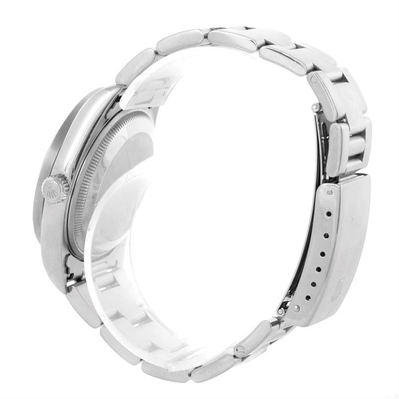 The image shows a side view of a Rolex Date 15210 Men's Stainless Steel Black Dial 15210 Men's Stainless Steel Black Dial model watch, displaying its crown, case, and bracelet.