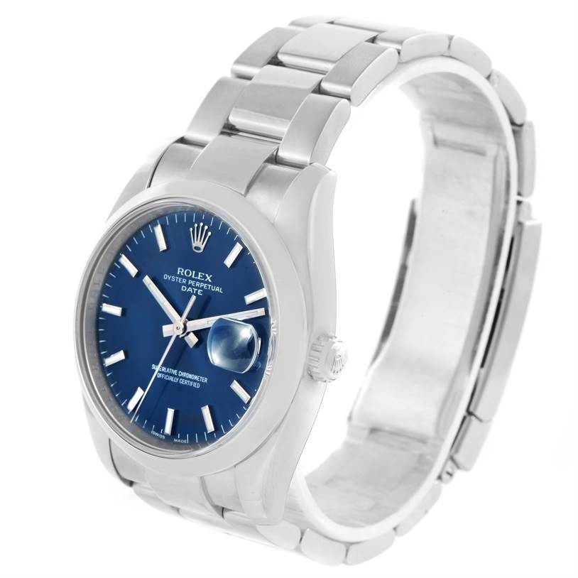 This image shows a Rolex Date 115200 Men's Stainless Steel Blue Dial 115200 Men's Stainless Steel Blue Dial watch at a slight angle, highlighting the face, crown, and part of the bracelet.