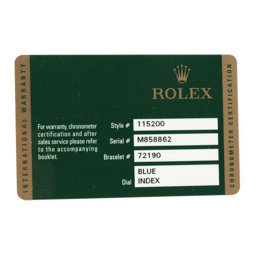 The image shows a warranty and certification card for a Rolex Date 115200 Men's Stainless Steel Blue Dial 115200 Men's Stainless Steel Blue Dial model watch.