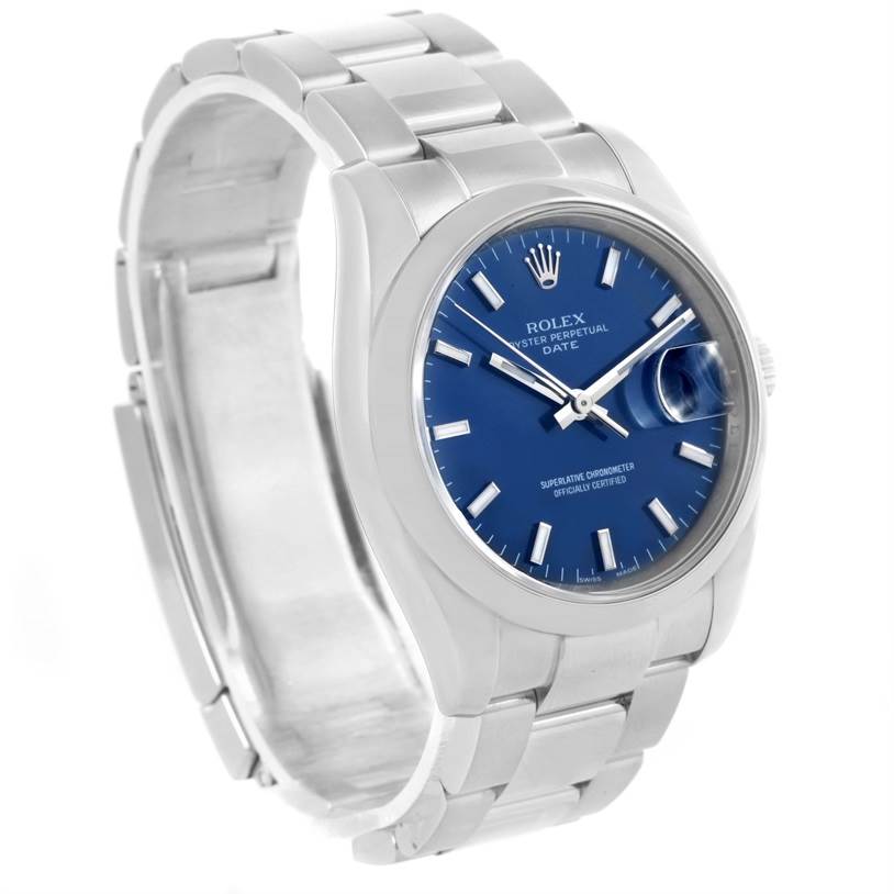 This image shows a Rolex Date 115200 Men's Stainless Steel Blue Dial 115200 Men's Stainless Steel Blue Dial model watch at a slight angle, featuring its stainless steel bracelet, blue dial, and Cyclops date window.