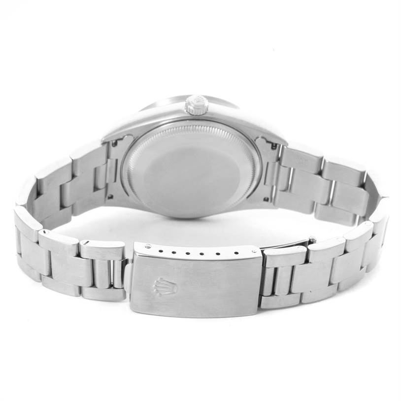 The image shows the back view of a Rolex Date 15210 Men's Stainless Steel Black Dial 15210 Men's Stainless Steel Black Dial model watch, focusing on the case back and bracelet.