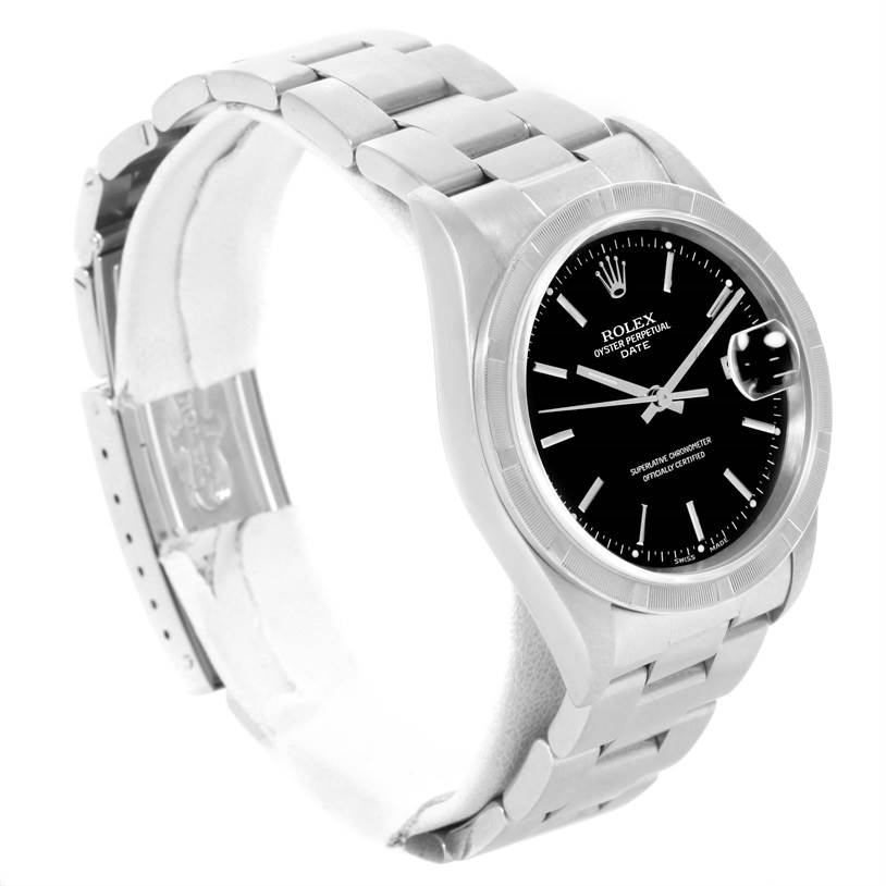 The image shows a side angle of a Rolex Date 15210 Men's Stainless Steel Black Dial 15210 Men's Stainless Steel Black Dial model, highlighting the dial, bezel, and part of the bracelet.