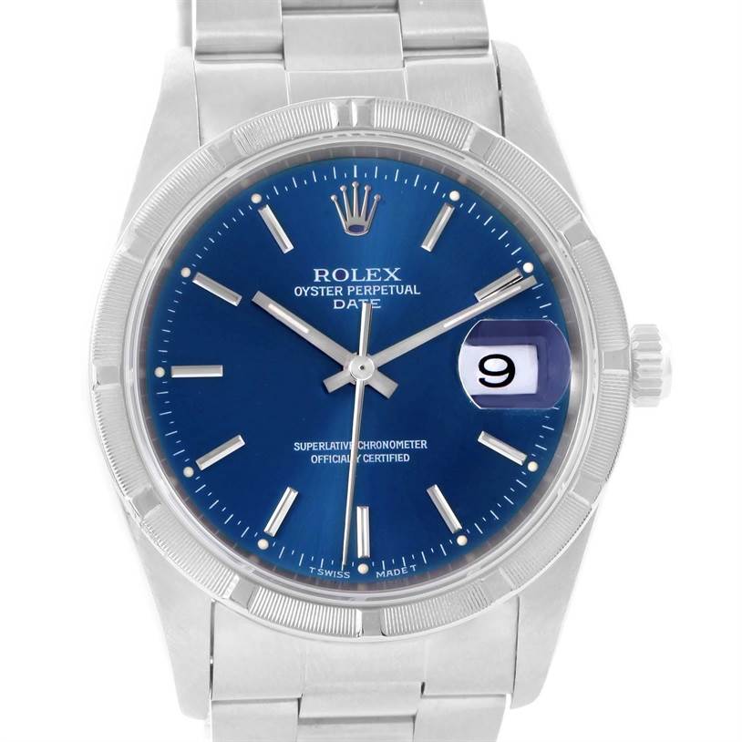 The image shows a front view of a Rolex Oyster Perpetual Date model watch, highlighting the dial, hands, date window, and bracelet.