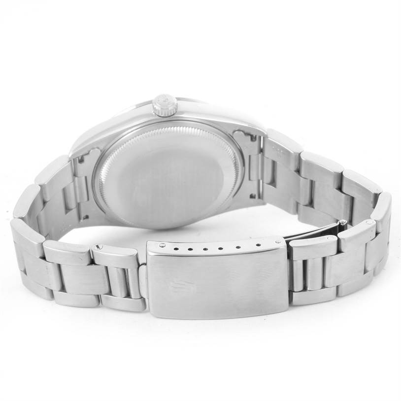 The image shows the back side and bracelet clasp of a Rolex Date 15200 Men's Stainless Steel Black Dial 15200 Men's Stainless Steel Black Dial model watch, viewed from an angle.