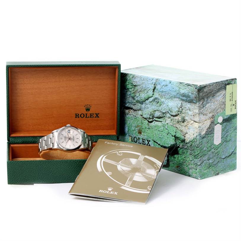 The image shows a Rolex Date 15200 Men's Stainless Steel Black Dial 15200 Men's Stainless Steel Black Dial watch, its original box, and accompanying factory service manual from a front angle.