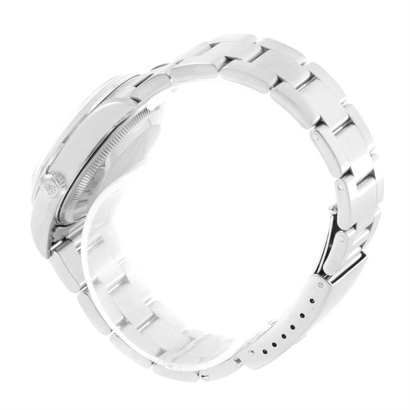 This image shows the side view of a Rolex Date 15200 Men's Stainless Steel Pink Dial 15200 Men's Stainless Steel Pink Dial's case and bracelet with the clasp visible.