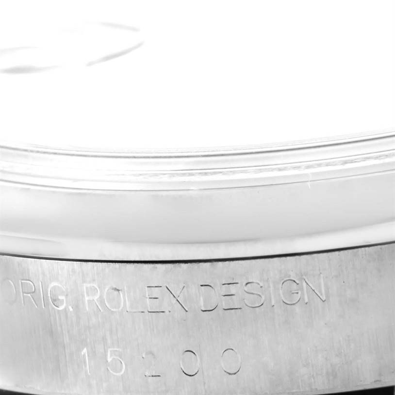 This image shows a close-up of the case side of a Rolex Date 15200 Men's Stainless Steel Pink Dial 15200 Men's Stainless Steel Pink Dial model, highlighting the "ORIG. ROLEX DESIGN" and model number 15200.