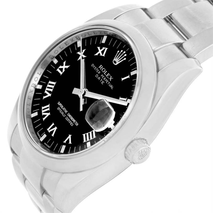 The image shows a Rolex Date 115200 Men's Stainless Steel Black Dial 115200 Men's Stainless Steel Black Dial model watch from a top-side angle, highlighting the black dial with Roman numerals, magnified date, and stainless steel bracelet.