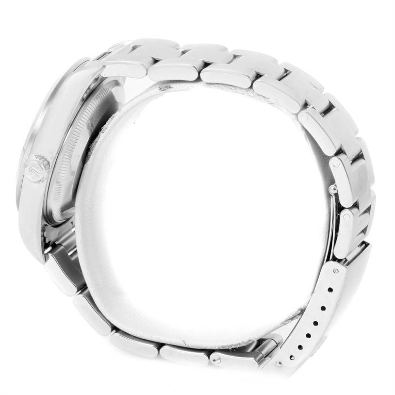 The image shows a side angle of a Rolex Date 15200 Men's Stainless Steel Black Dial 15200 Men's Stainless Steel Black Dial model, featuring the case, crown, and bracelet.