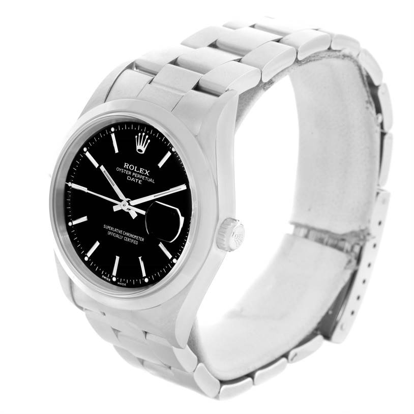 The image shows a Rolex Oyster Perpetual Date watch from an angled side view, highlighting the face, bezel, and bracelet.