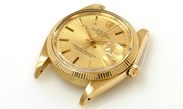 The image shows the dial, bezel, lugs, and crown of a Rolex Date 1503 Men's Yellow Gold Champagne Dial 1503 Men's Yellow Gold Champagne Dial model watch from an angled viewpoint.