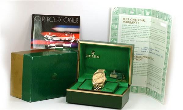 The image shows a Rolex Date 1503 Men's Yellow Gold Champagne Dial 1503 Men's Yellow Gold Champagne Dial model watch in its green box, with the outer box, warranty card, and manual.