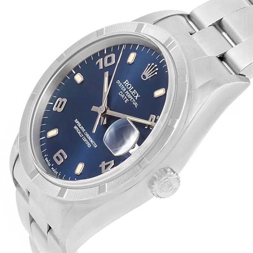 The image shows a Rolex Date 15210 Men's Stainless Steel Blue Dial 15210 Men's Stainless Steel Blue Dial watch at an angle highlighting the face, crown, and part of the bracelet.