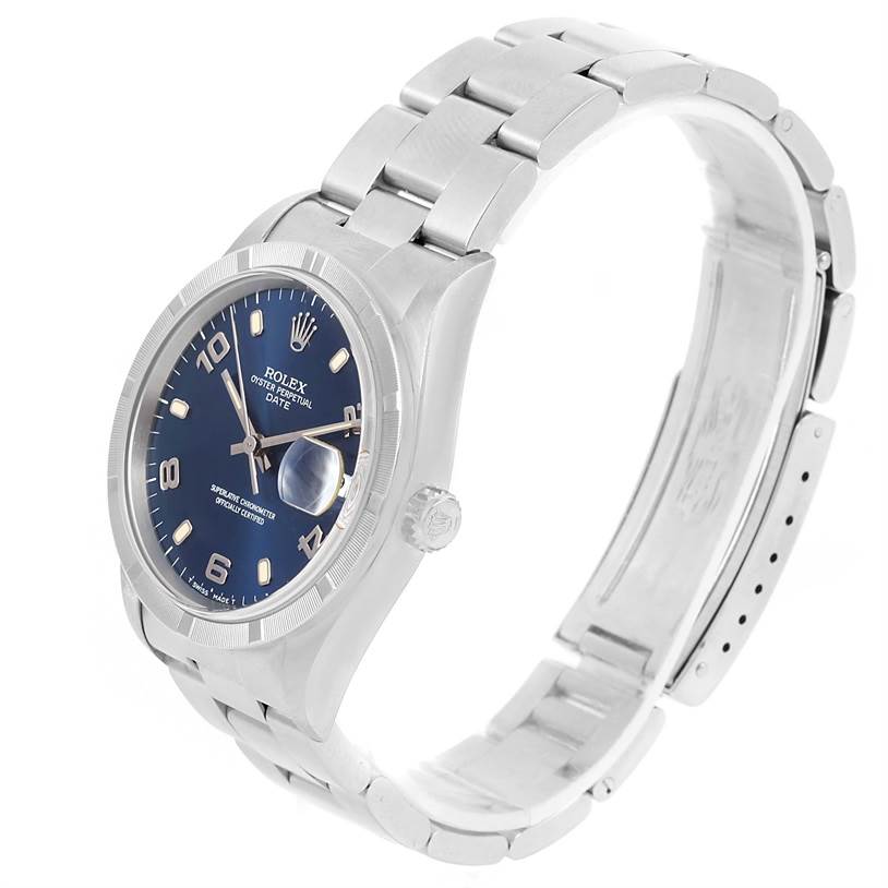 The Rolex Date 15210 Men's Stainless Steel Blue Dial 15210 Men's Stainless Steel Blue Dial watch is shown at a three-quarter angle, highlighting the blue dial, bracelet, and crown.