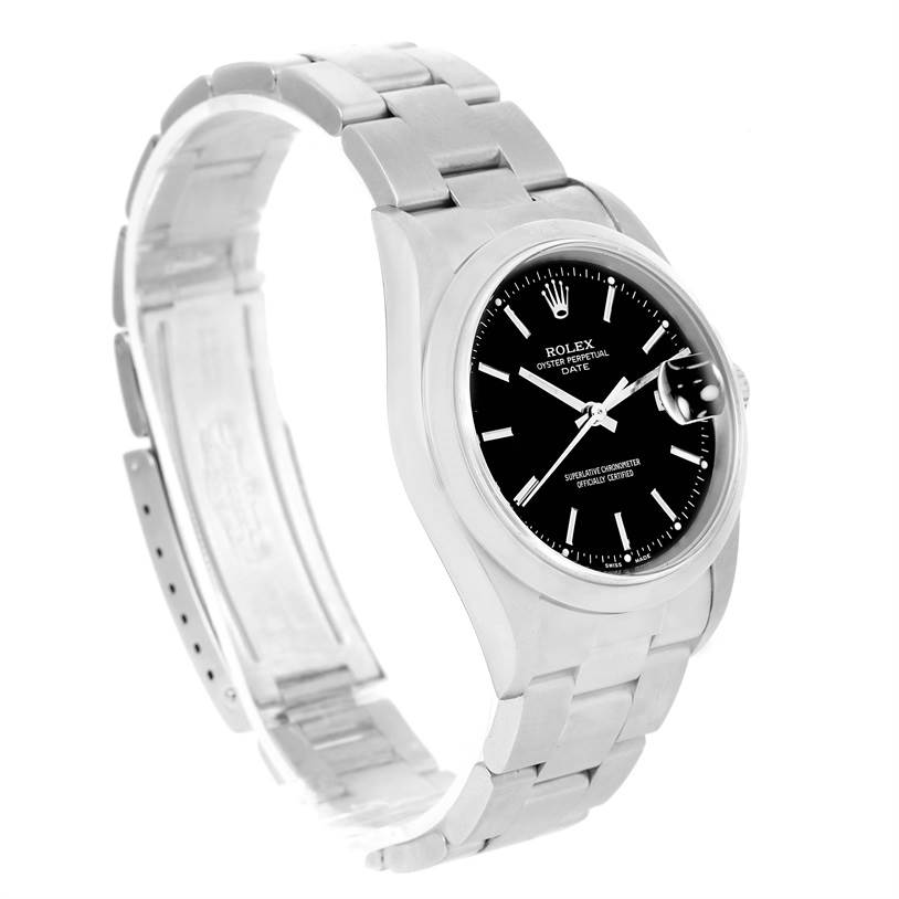 This image shows a Rolex Oyster Perpetual Date watch at a slight angle, highlighting the black dial, stainless steel case, and bracelet.