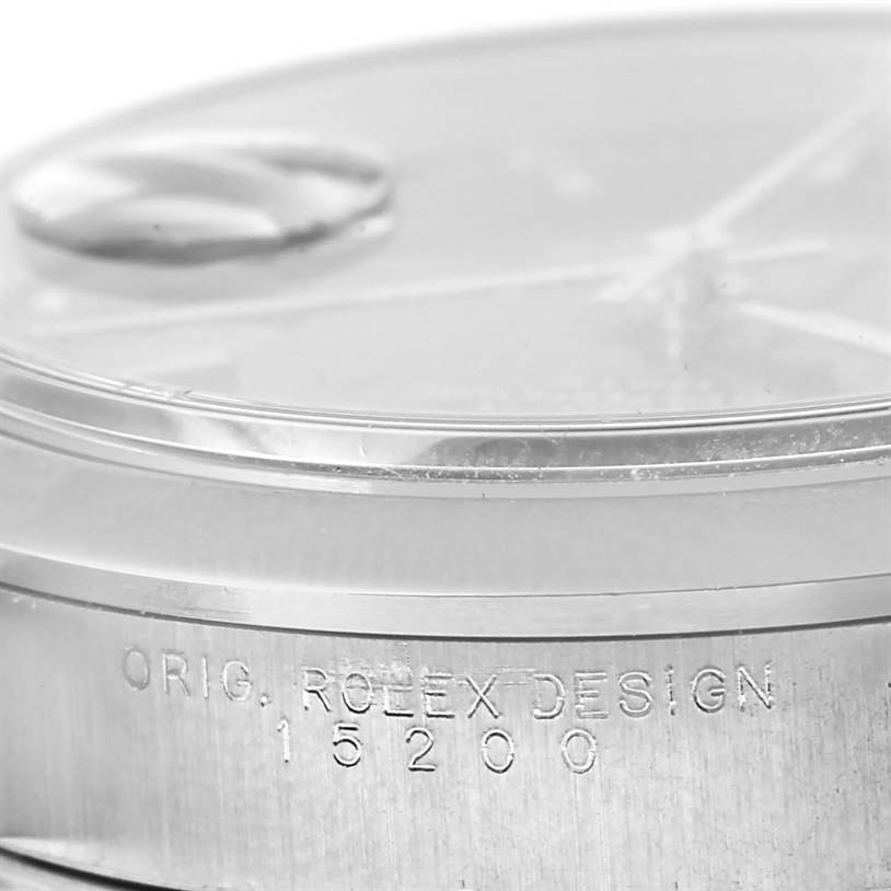 This close-up image shows the side of a Rolex Date 15200 Men's Black Dial 15200 Men's Black Dial model with engravings on the case.