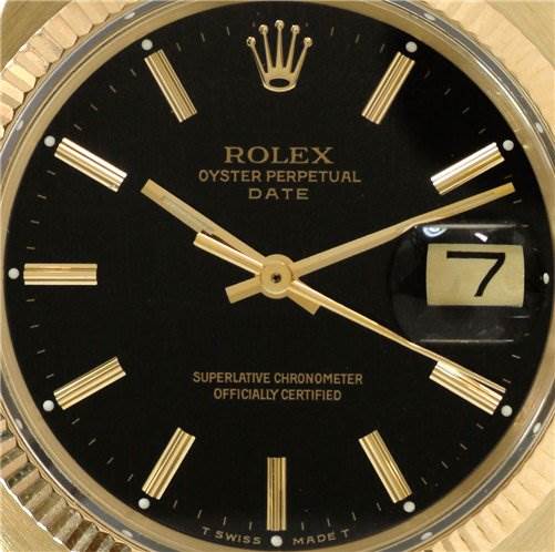 Close-up of a Rolex Date 1503 Men's Yellow Gold Black Dial 1503 Men's Yellow Gold Black Dial model watch face displaying the dial, hands, brand logo, and date window.