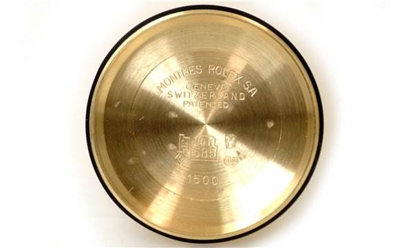 This image shows the inside of the case back of a Rolex Date 1503 Men's Yellow Gold Black Dial 1503 Men's Yellow Gold Black Dial model watch, viewed from a top-down angle.