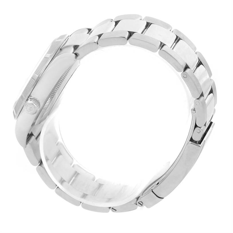 The image shows a side view of the Rolex Date 115210 Men's Stainless Steel White Dial 115210 Men's Stainless Steel White Dial model watch, focusing on the bracelet and the side of the watch case.