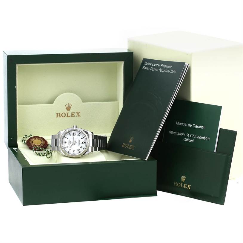 The image shows a Rolex Date 115210 Men's Stainless Steel White Dial 115210 Men's Stainless Steel White Dial model watch in its box with manuals and a tag.