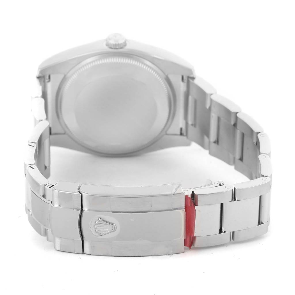 This image shows the back case and bracelet of a Rolex Date 115234 Men's Stainless Steel Black Dial 115234 Men's Stainless Steel Black Dial model watch from a rear angle.