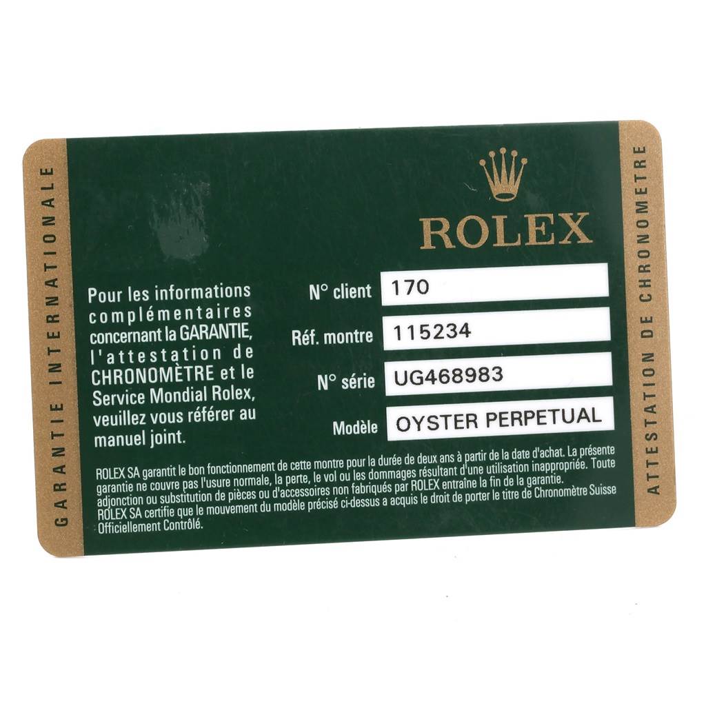 This image shows the warranty card for a Rolex Date 115234 Men's Stainless Steel Black Dial 115234 Men's Stainless Steel Black Dial model with identification details.