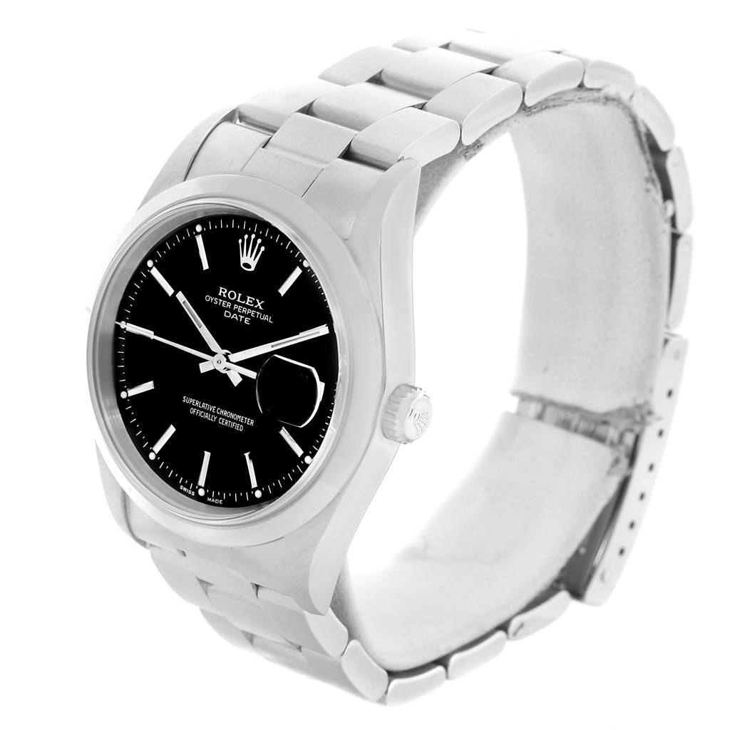 The image shows a Rolex Oyster Perpetual Date model at a three-quarter angle, highlighting its black dial, silver case, and bracelet.