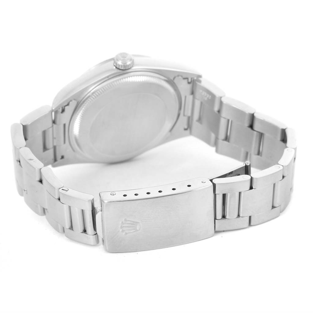 The image shows the backside and clasp of a Rolex Date 15200 Men's Stainless Steel Black Dial 15200 Men's Stainless Steel Black Dial model watch from an angled view.