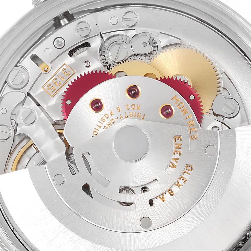 This image shows the intricate inner mechanical movement of a Rolex Date 15210 Men's Stainless Steel Blue Dial 15210 Men's Stainless Steel Blue Dial model watch from a close-up angle.