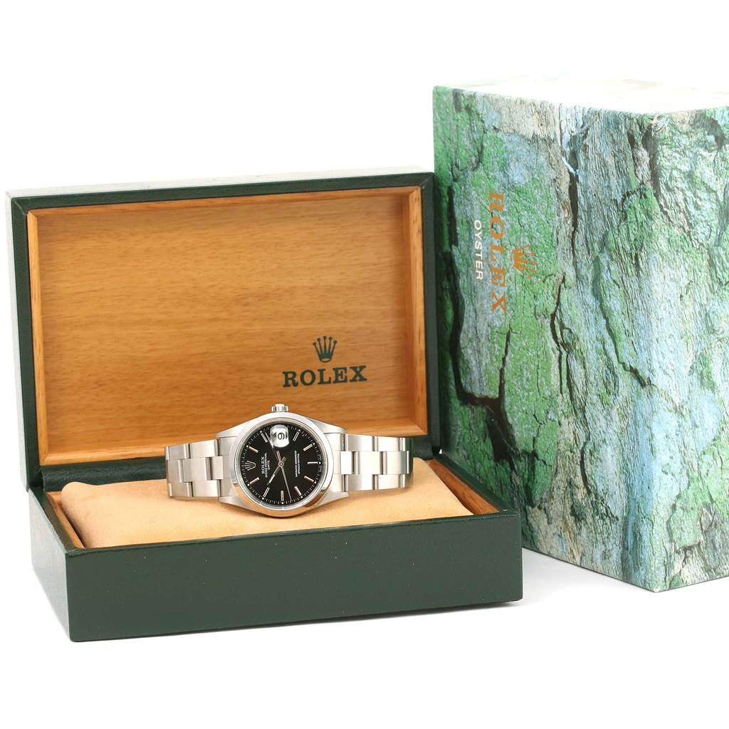 The Rolex Date 15200 Men's Stainless Steel Black Dial 15200 Men's Stainless Steel Black Dial model watch is displayed inside an open Rolex box, with its original packaging beside it.