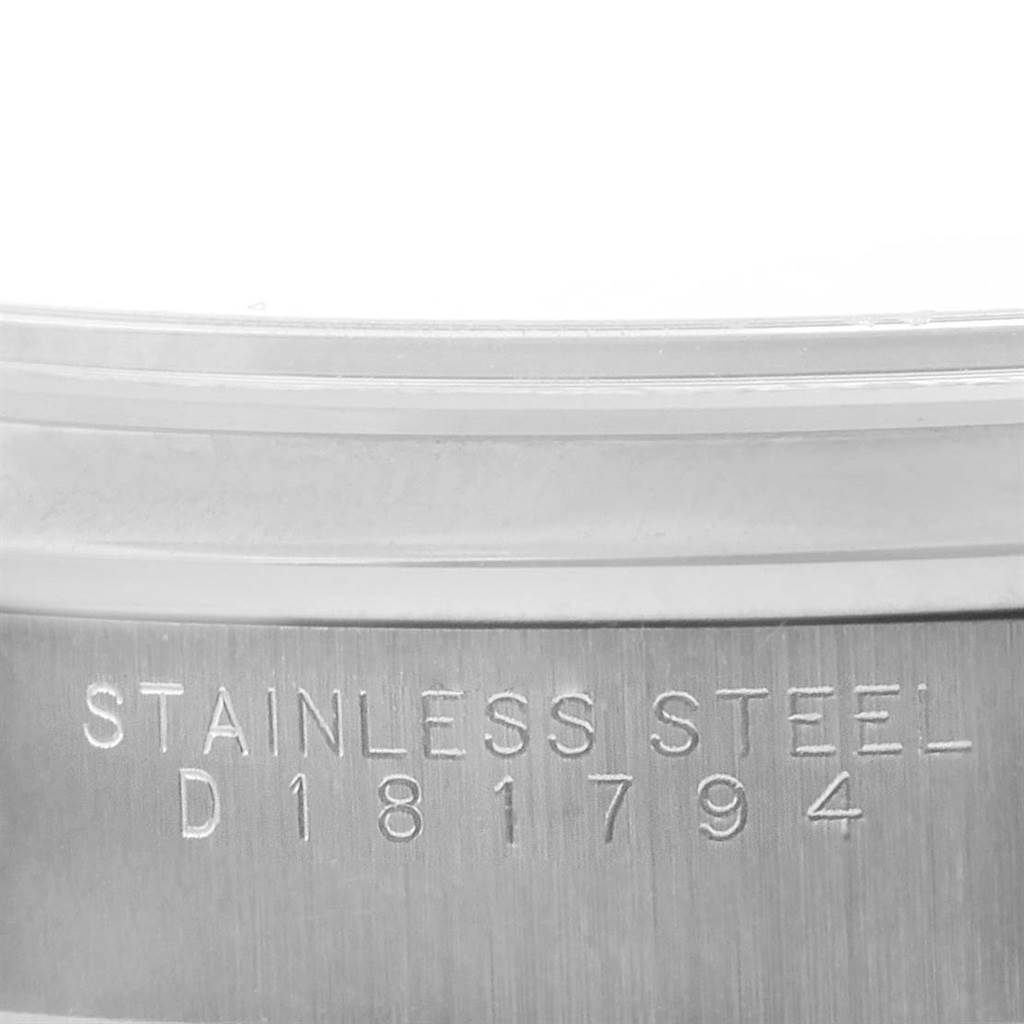 This image shows a close-up of the stainless steel casing with the serial number of the Rolex Date 15200 Men's Stainless Steel Black Dial 15200 Men's Stainless Steel Black Dial model watch.