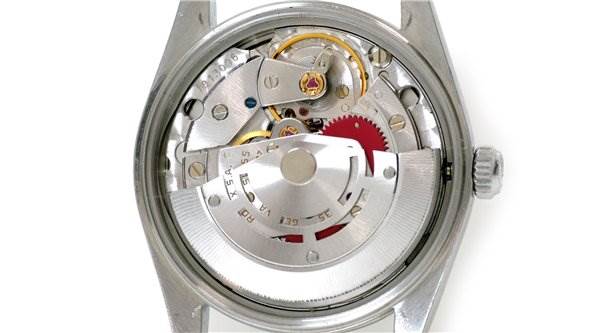 This image shows the inner mechanics of a Rolex Date 15000 Men's Stainless Steel  15000 Men's Stainless Steel  model watch from a direct back angle.