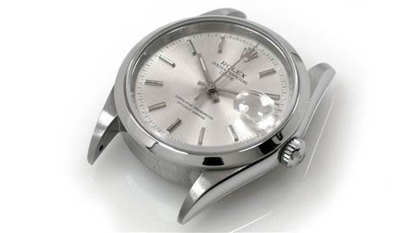 The image shows a close-up, side angle of a Rolex Date 15200 Men's Stainless Steel Silver Dial 15200 Men's Stainless Steel Silver Dial model watch, highlighting the face, crown, and lugs.