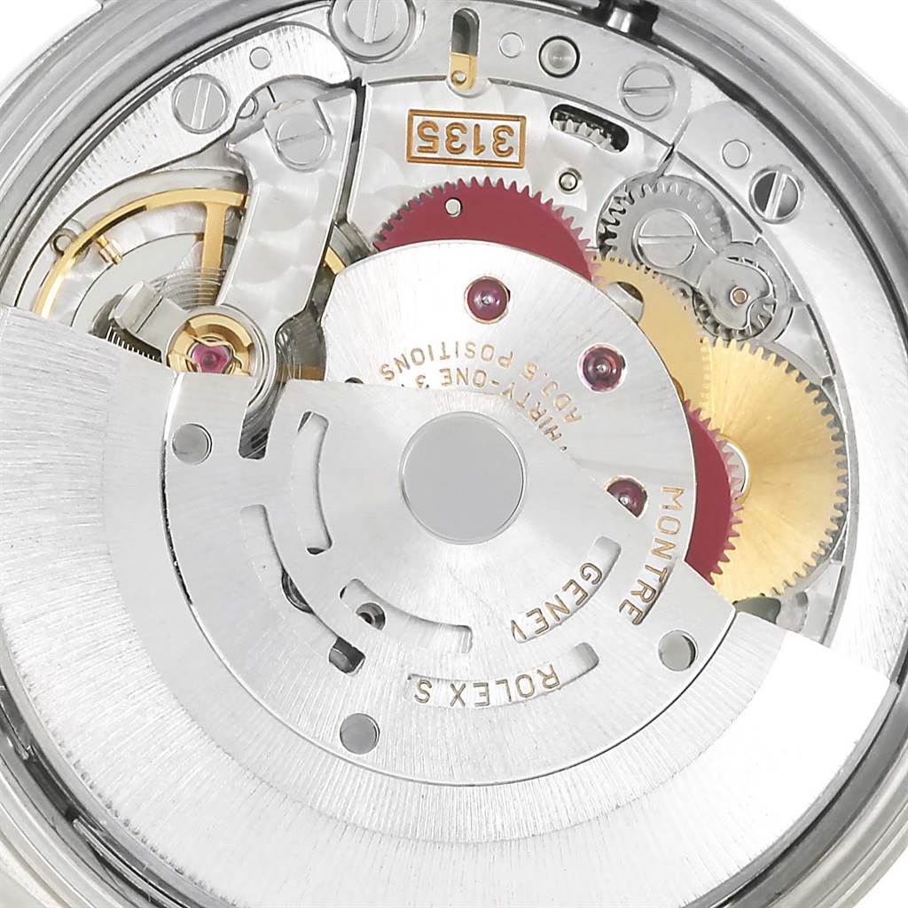 The image shows a close-up view of the movement inside a Rolex Date 15200 Men's Stainless Steel Blue Dial 15200 Men's Stainless Steel Blue Dial model watch, highlighting its intricate mechanical parts.