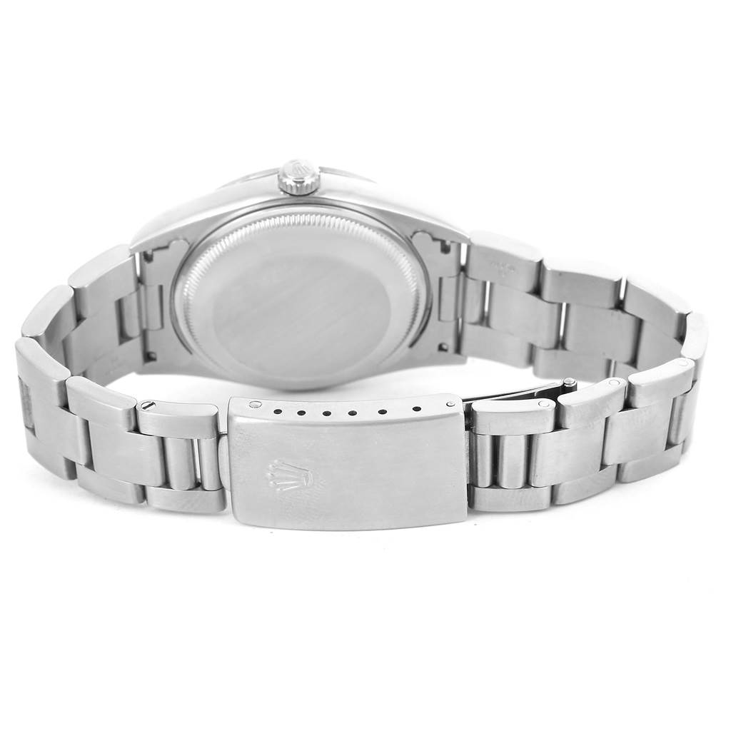 The image shows the back view of a Rolex Date 15200 Men's Stainless Steel Blue Dial 15200 Men's Stainless Steel Blue Dial model watch, highlighting its clasp and case back.