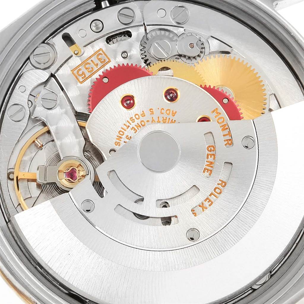 The image shows the internal mechanism and movement of the Rolex Date 15223 Men
s Steel and Gold (two tone) White Dial 15223 Men
s Steel and Gold (two tone) White Dial model watch from a close-up angle.